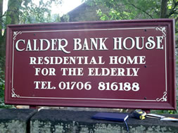 wooden painted sign